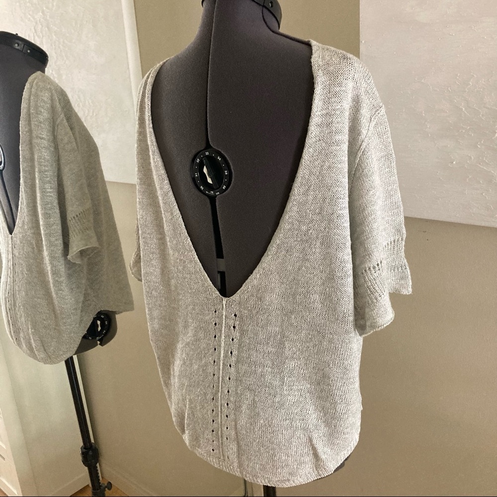 Light grey slub sweater with open knit detail